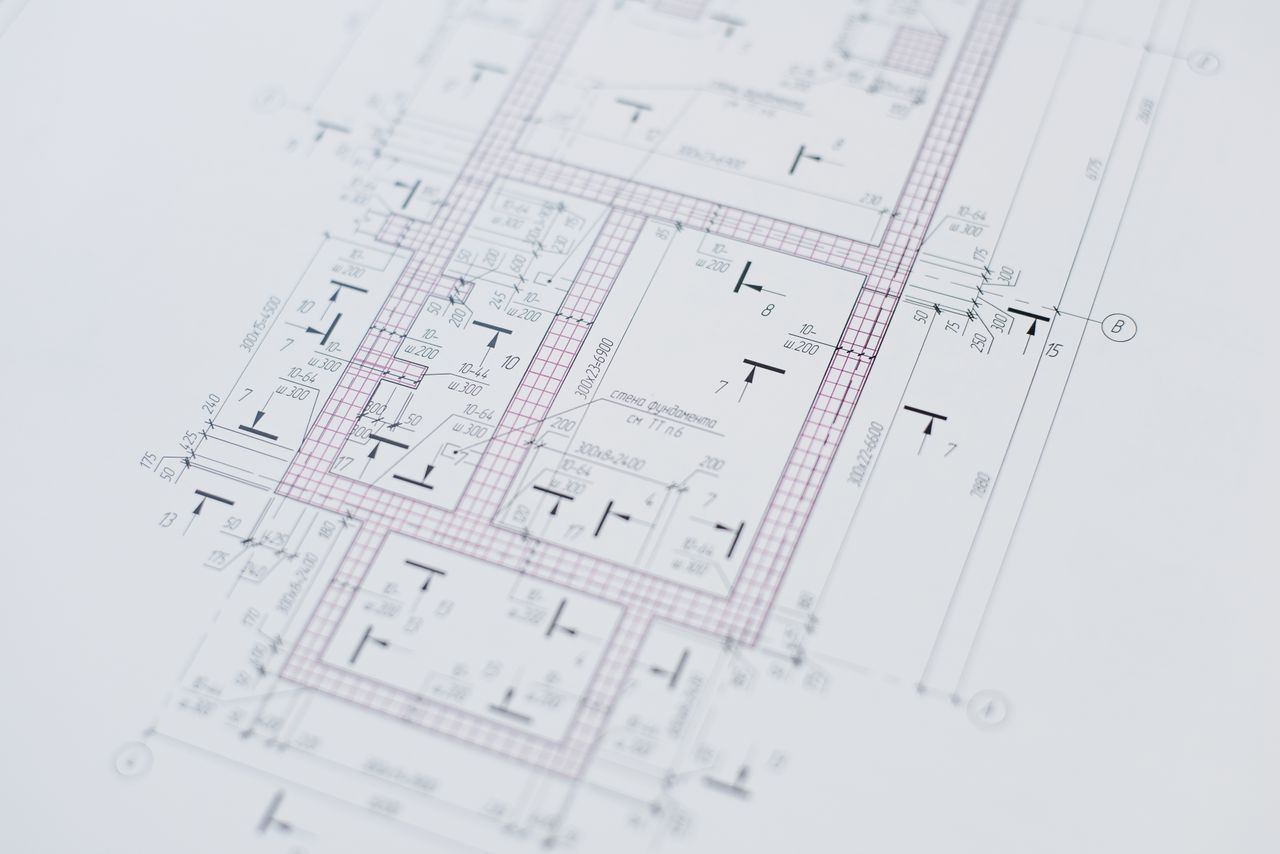Crafting Captivating Headlines: Your awesome post title goes here Close-up view of an architectural floor plan showcasing design creativity and layout precision.